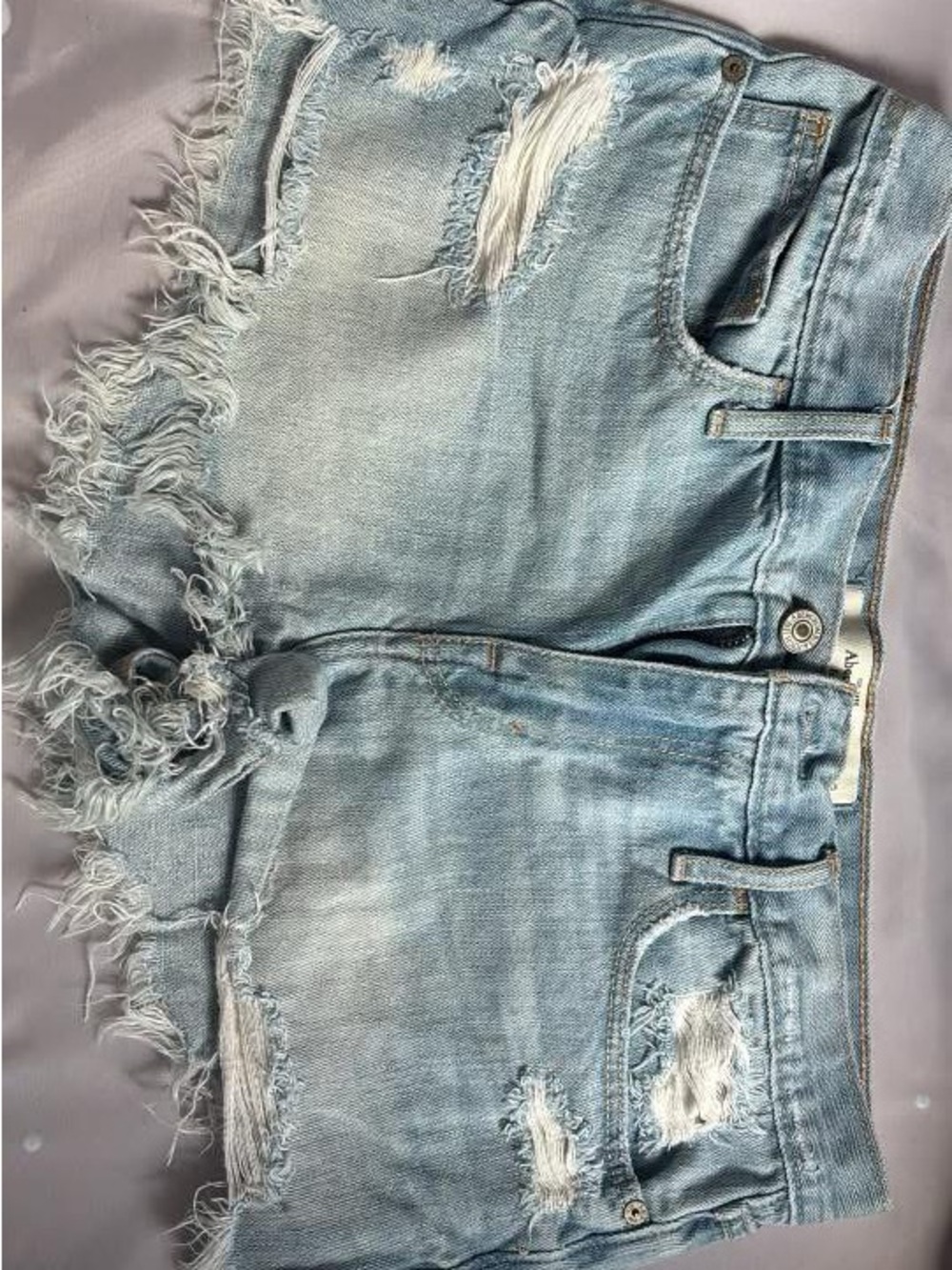 Light Wash Distressed Denim Cutoff Shorts